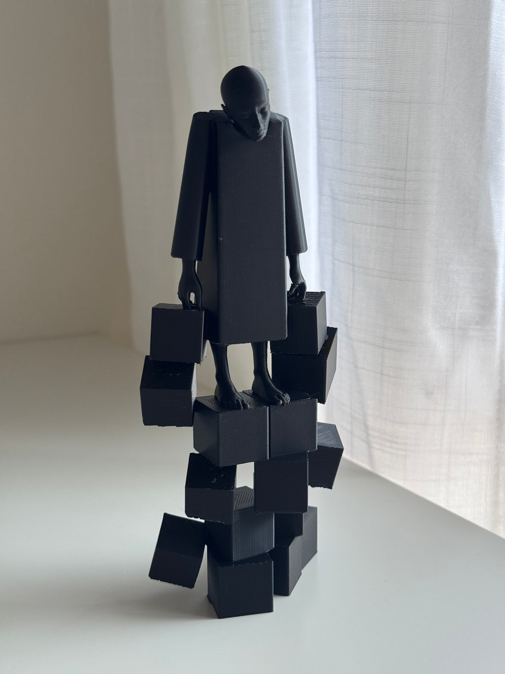 The Weight We Carry Sculpture