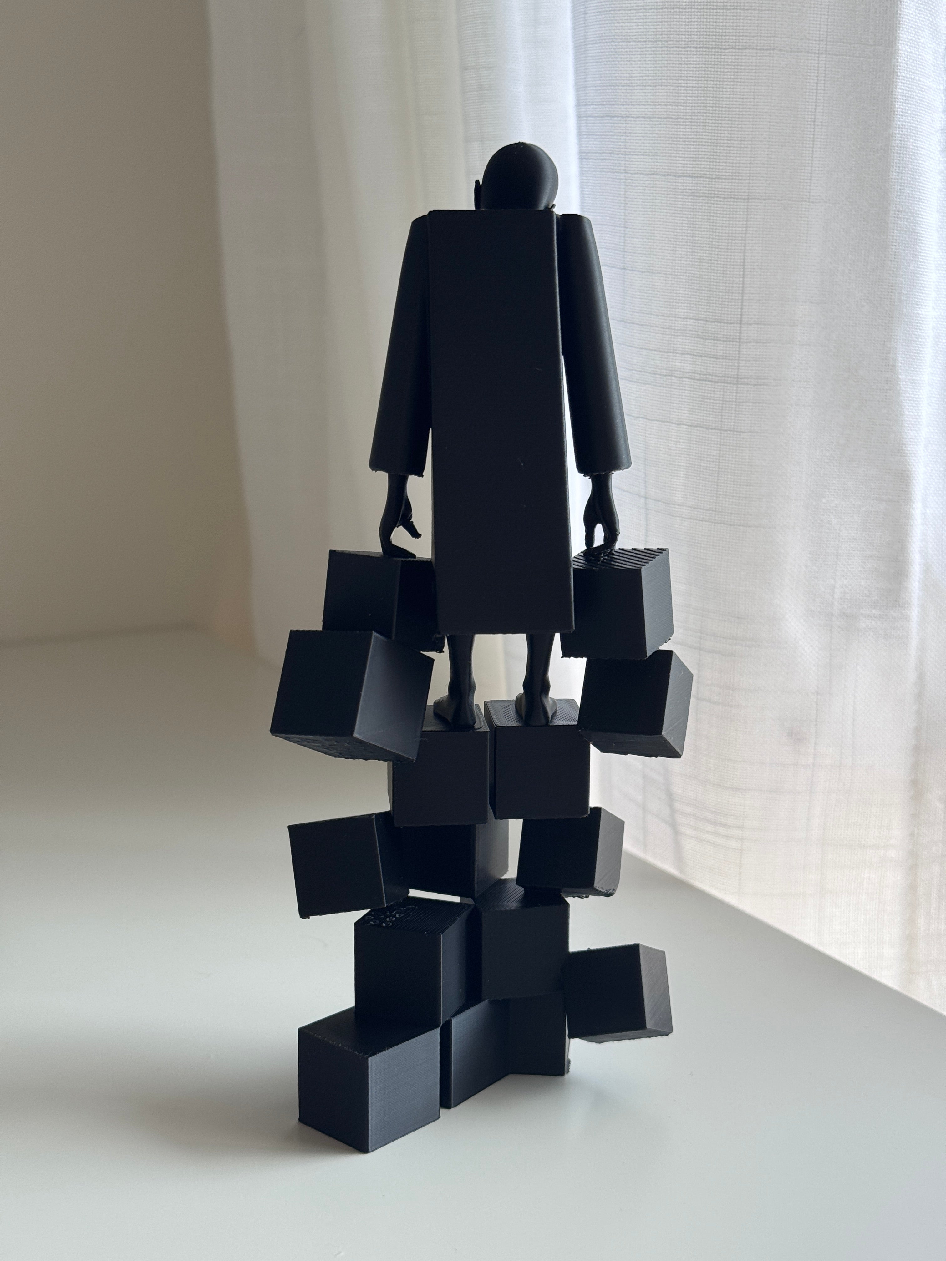 The Weight We Carry Sculpture