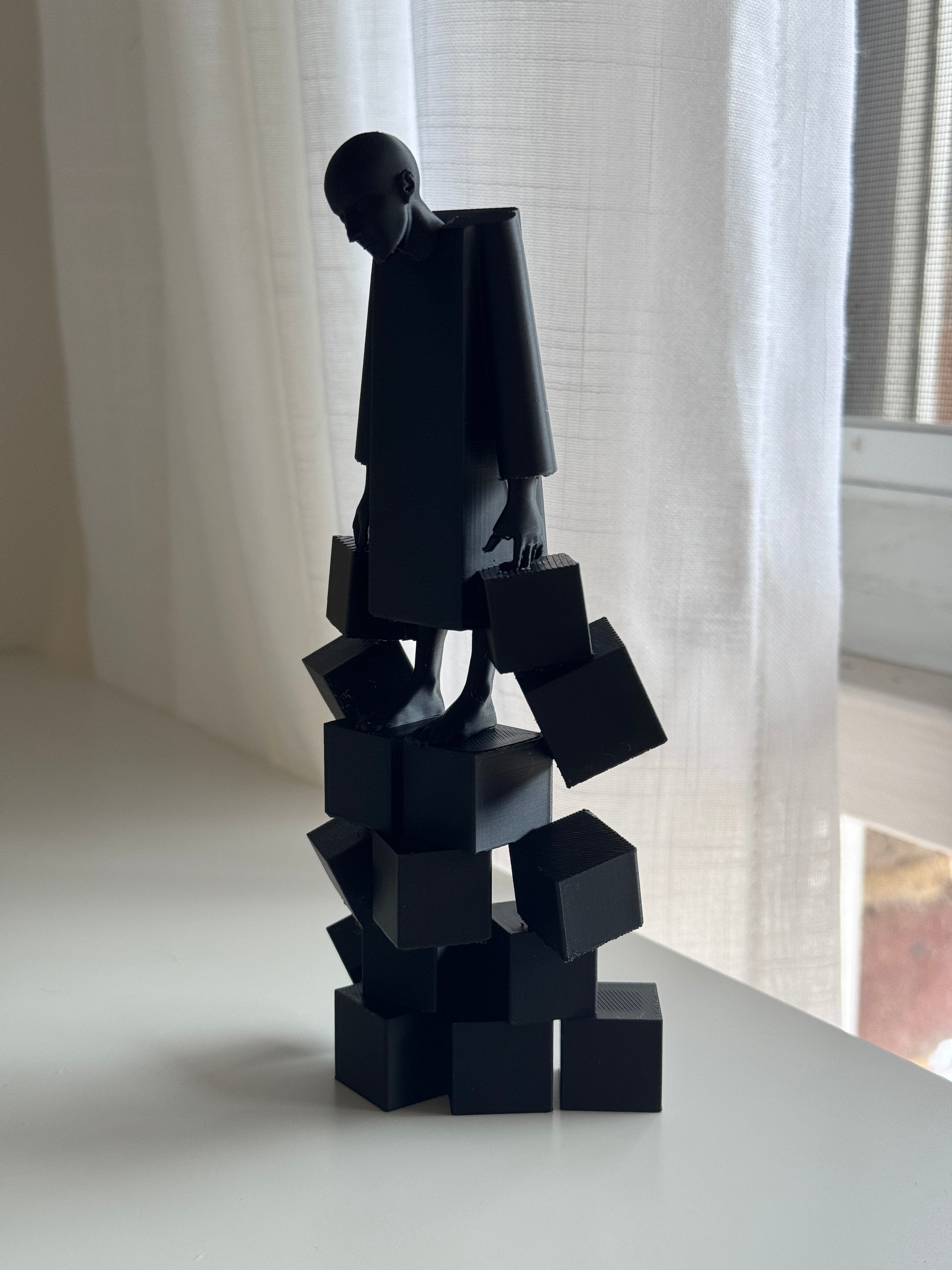 The Weight We Carry Sculpture