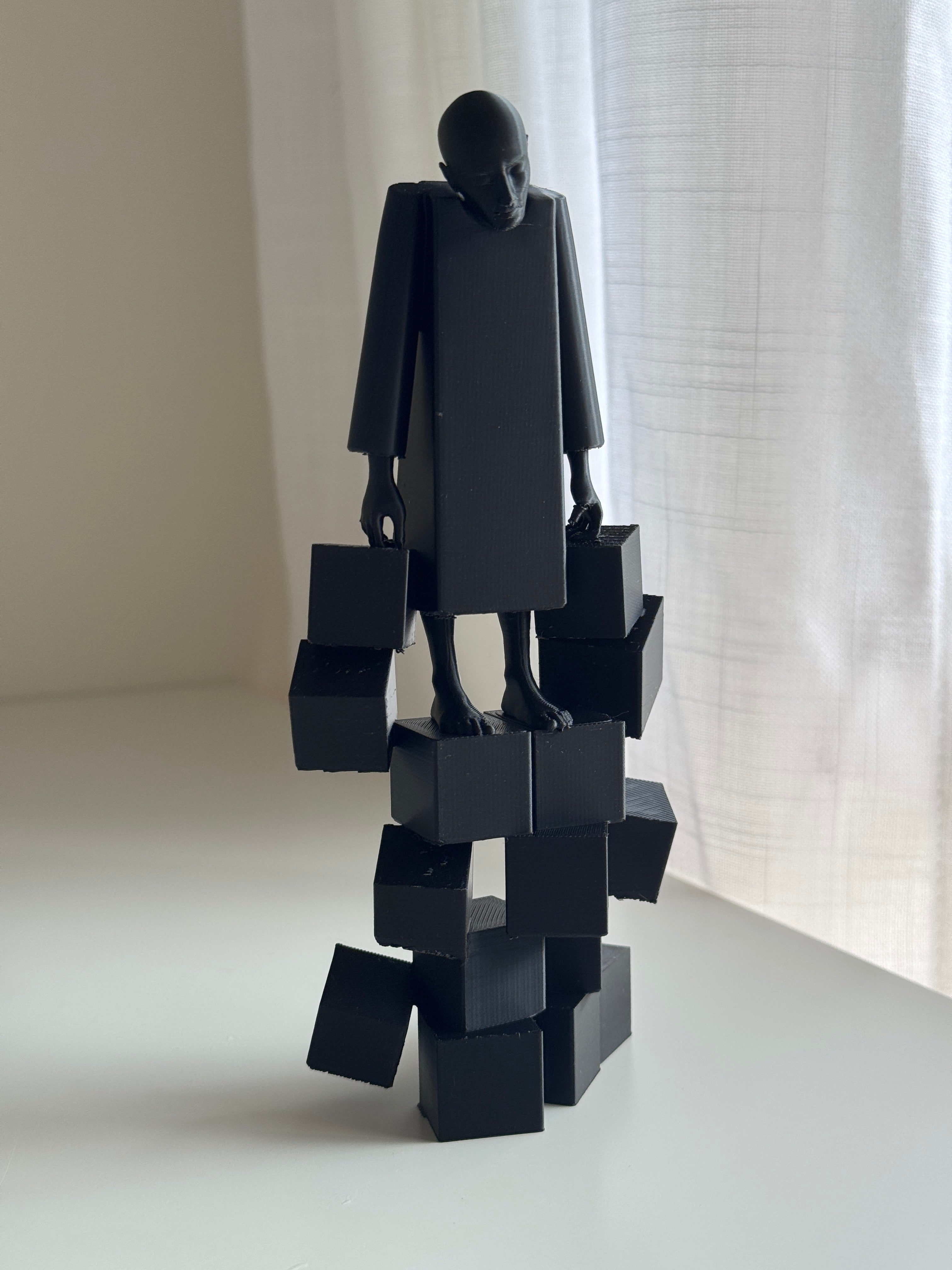 The Weight We Carry Sculpture