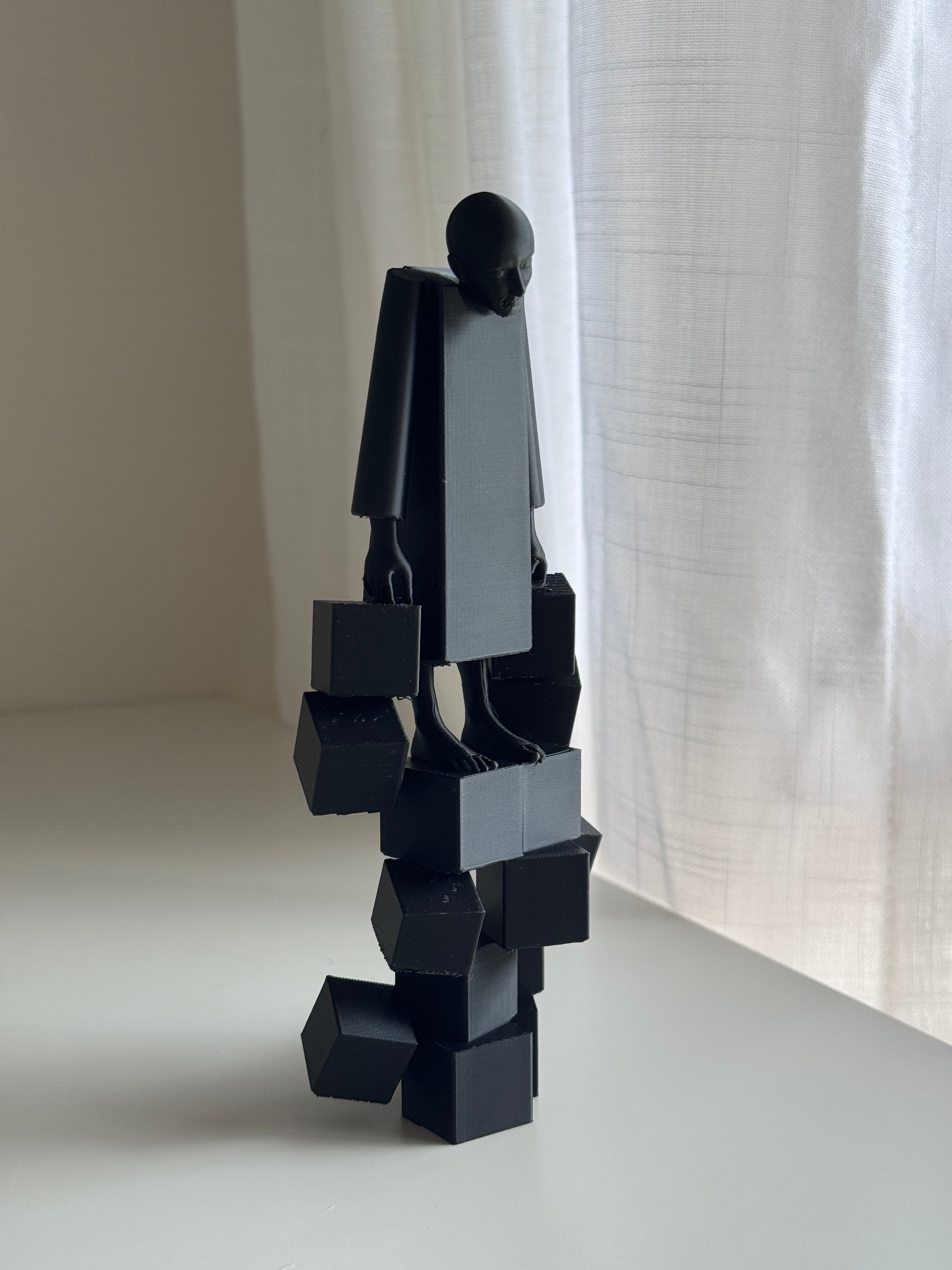 The Weight We Carry Sculpture