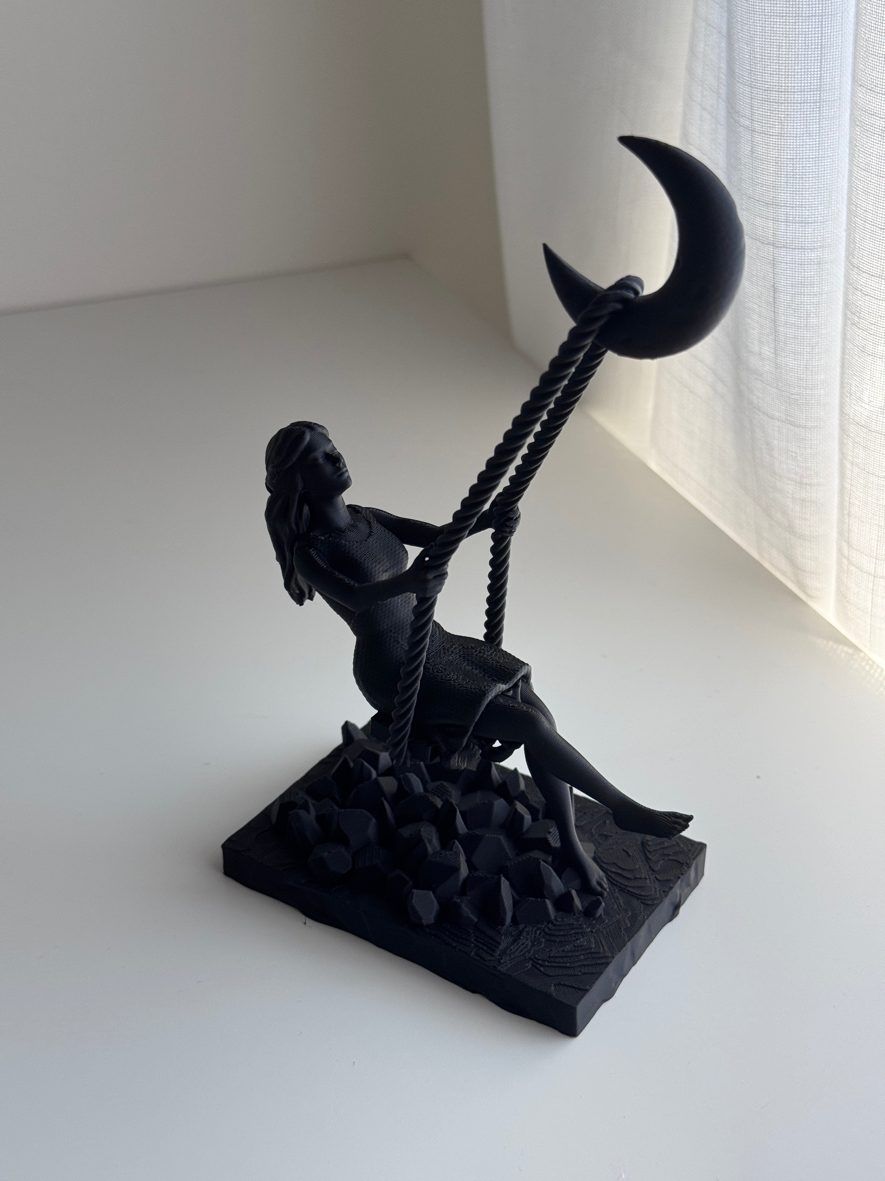 Swing to the Moon Sculpture