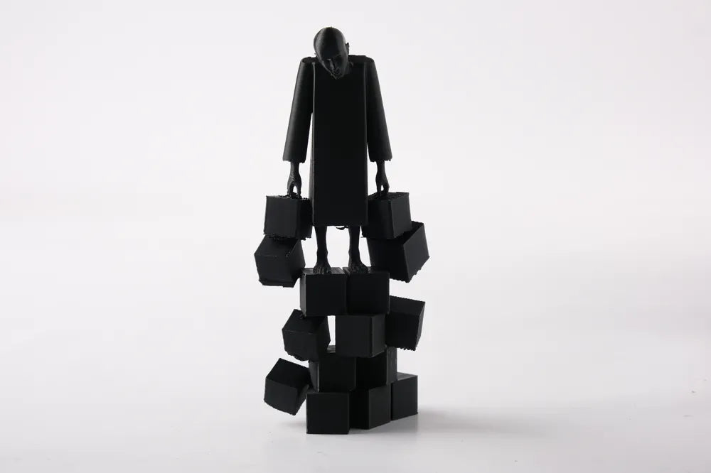 The Weight We Carry Sculpture